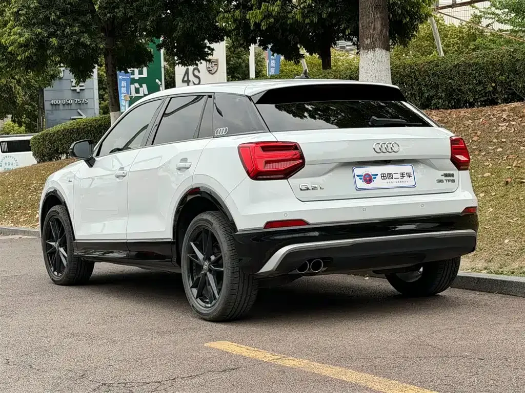 Audi Q2L — фото 6