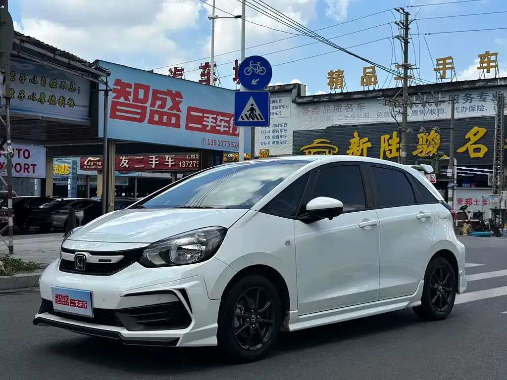Honda Fit — фото 8