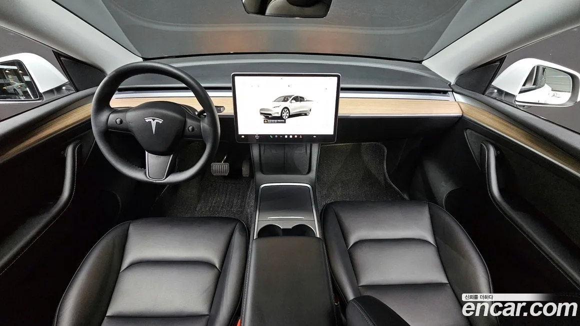 Tesla Model Y — фото 7