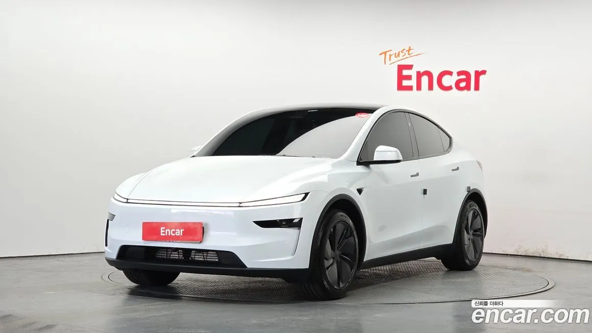 Tesla Model Y — фото 1