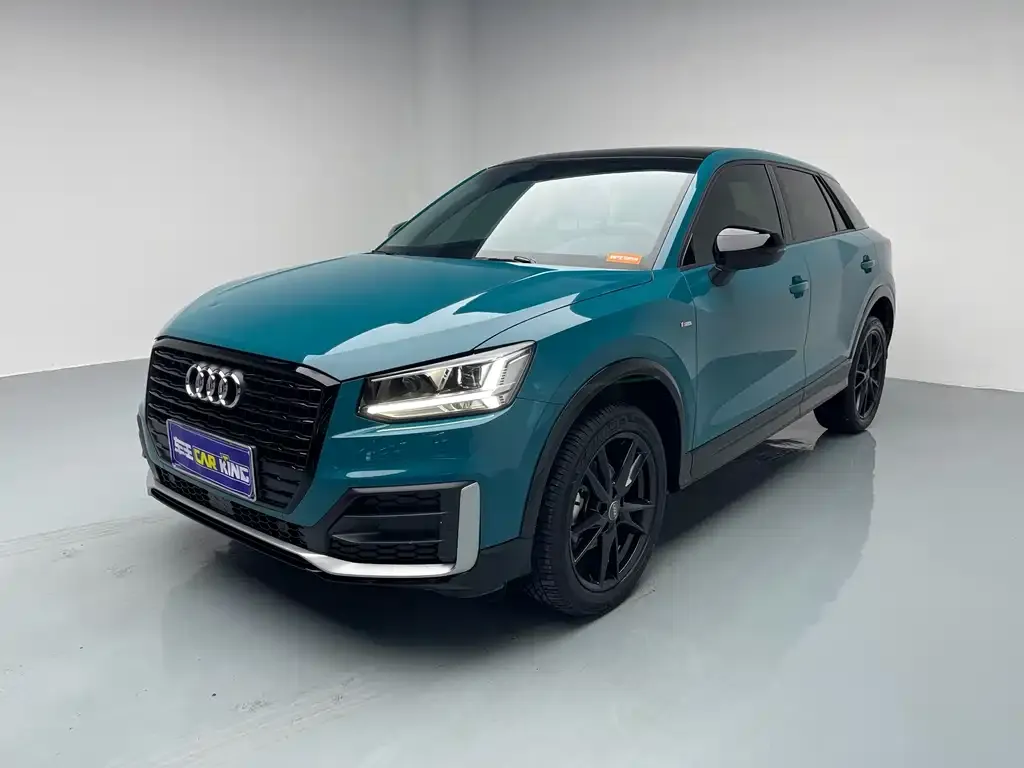 Audi Q2L — фото 1