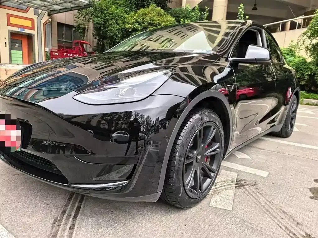 Tesla Model Y — фото 7