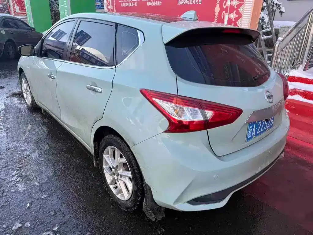 Nissan Tiida — фото 2