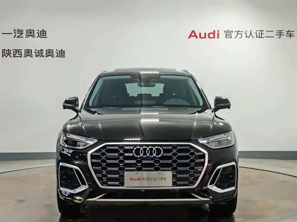 Audi Q5L — фото 10