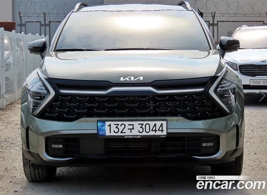 Kia Sportage — фото 1