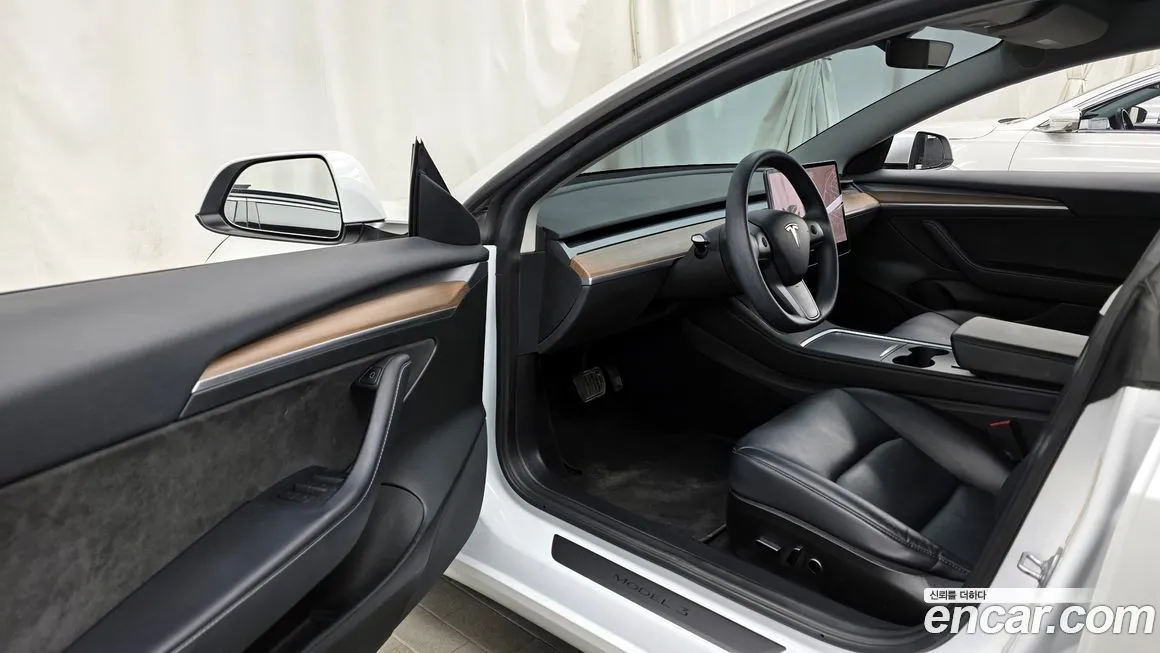 Tesla Model 3 — фото 3
