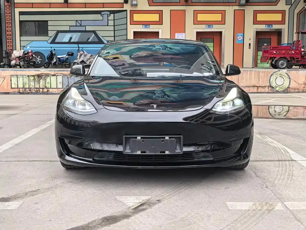 Tesla Model 3 — фото 9
