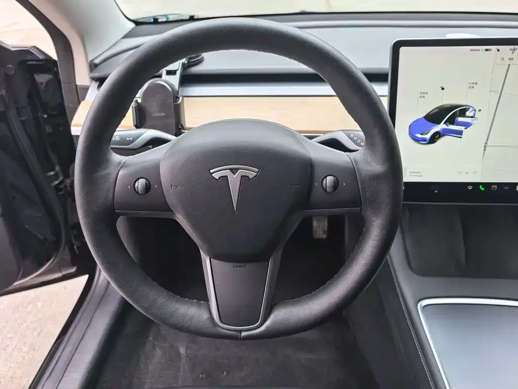 Tesla Model 3 — фото 5