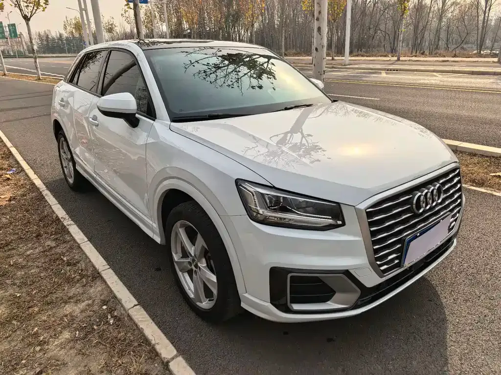 Audi Q2L — фото 4