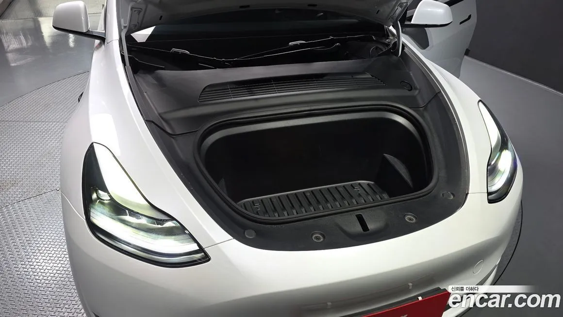 Tesla Model Y — фото 7
