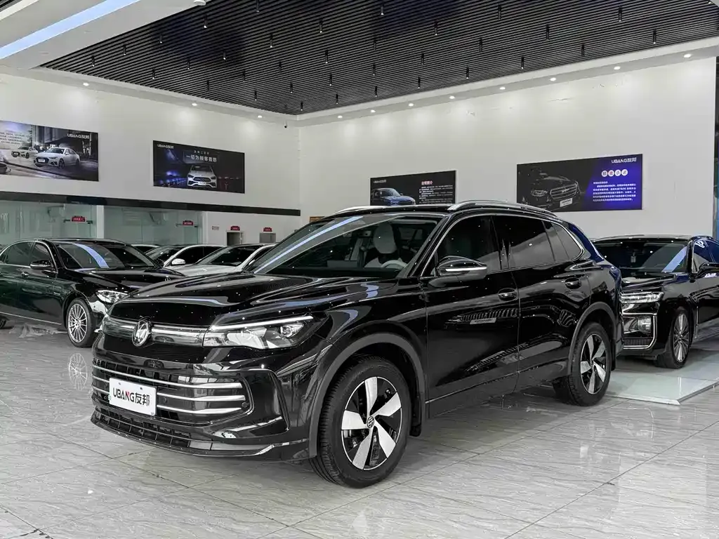 Volkswagen Tiguan L — фото 1