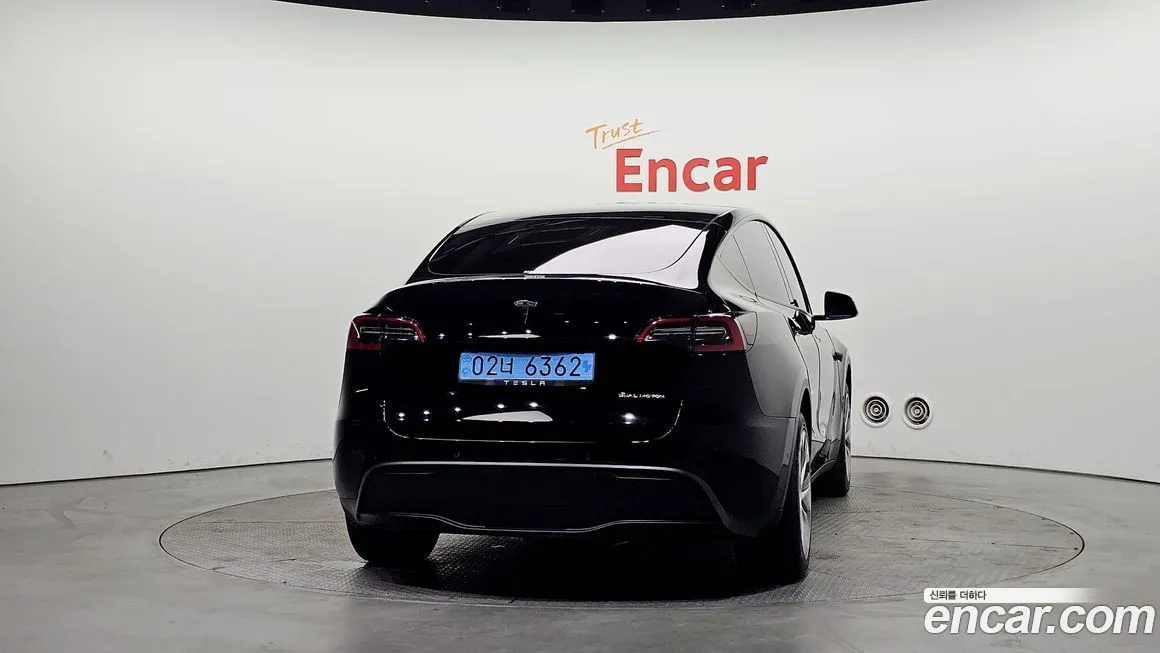 Tesla Model Y — фото 8