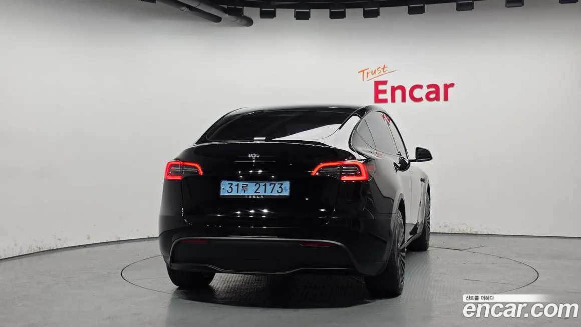 Tesla Model Y — фото 6