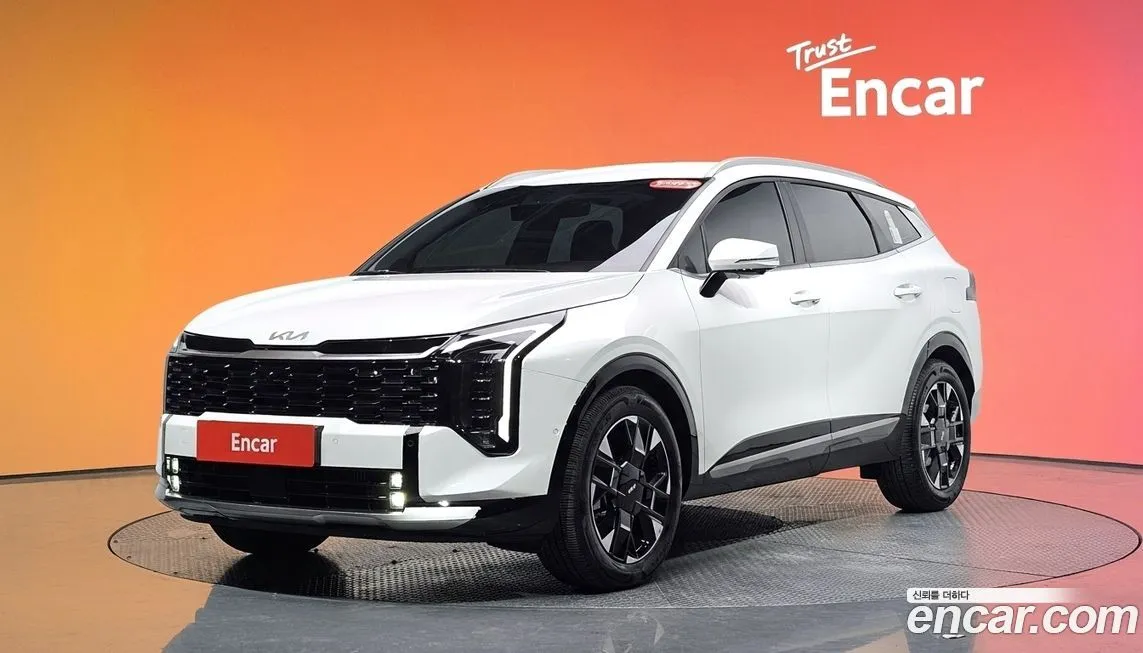 Kia Sportage — фото 1