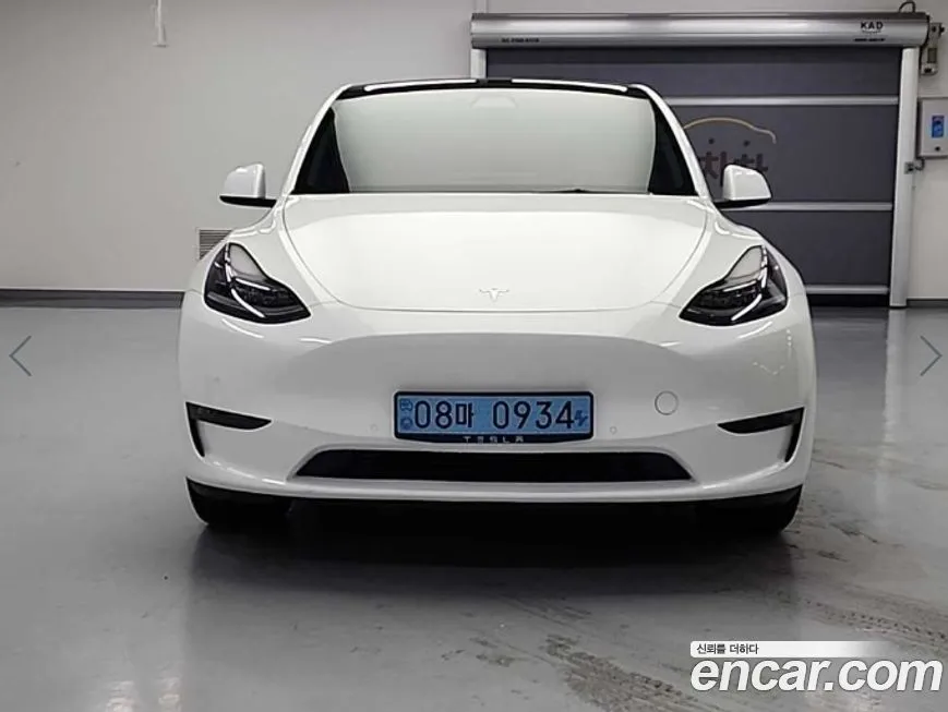 Tesla Model Y — фото 8