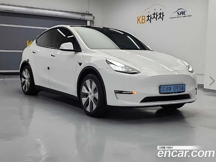 Tesla Model Y — фото 5