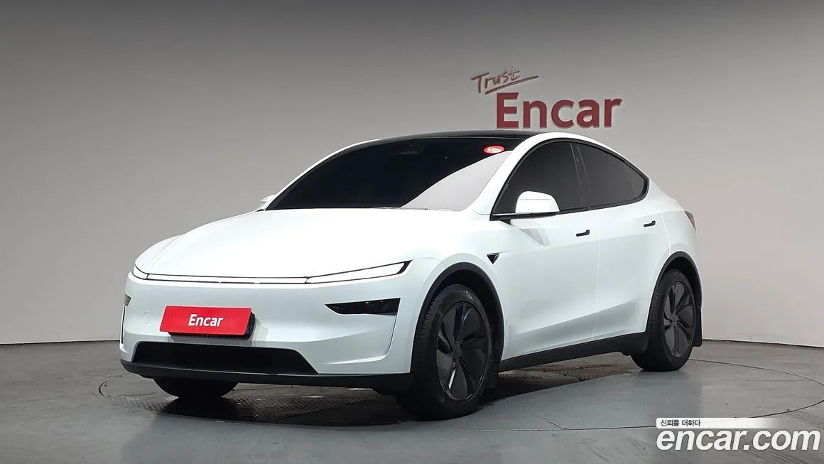 Tesla Model Y — фото 1