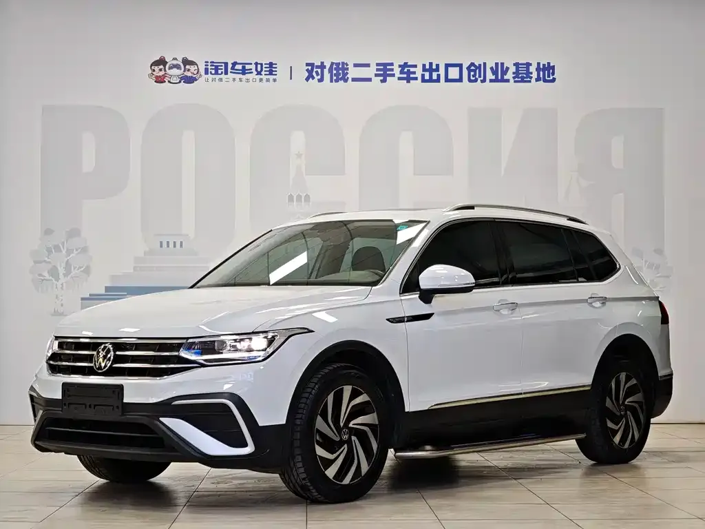 Volkswagen Tiguan L — фото 1