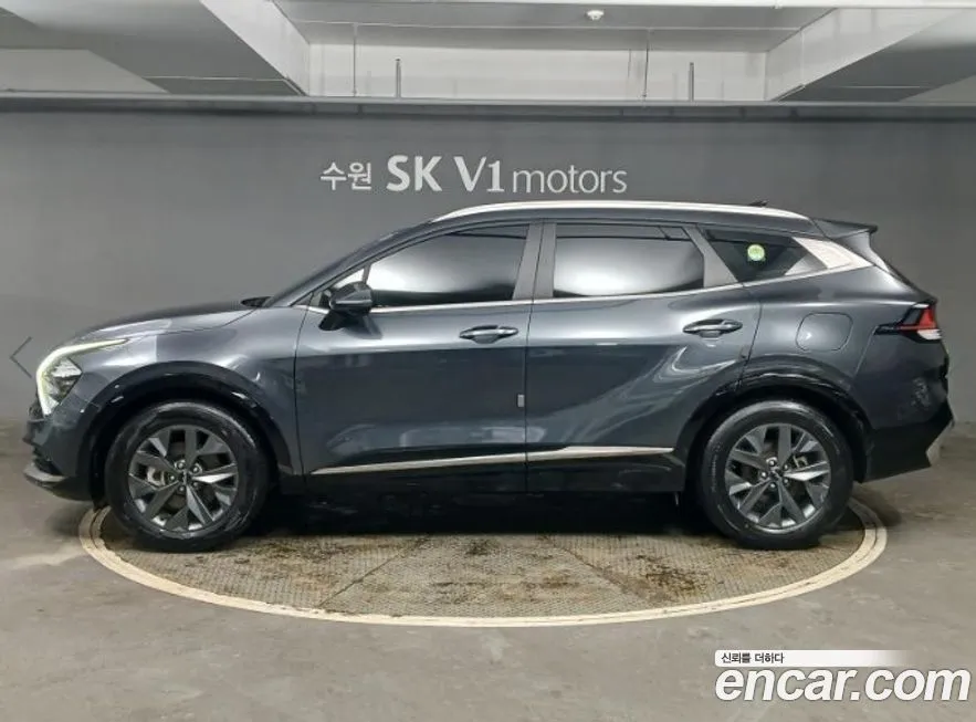 Kia Sportage — фото 1