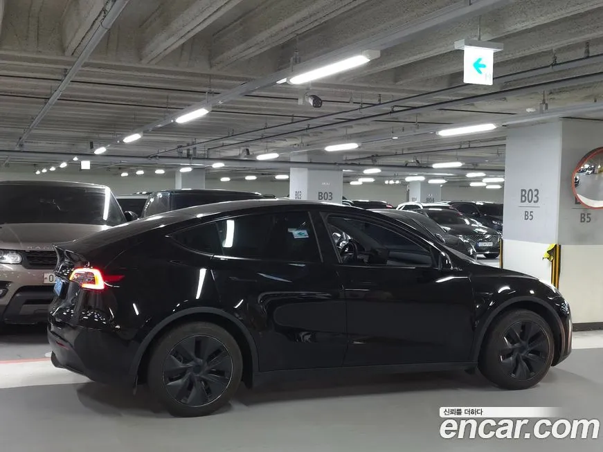 Tesla Model Y — фото 7