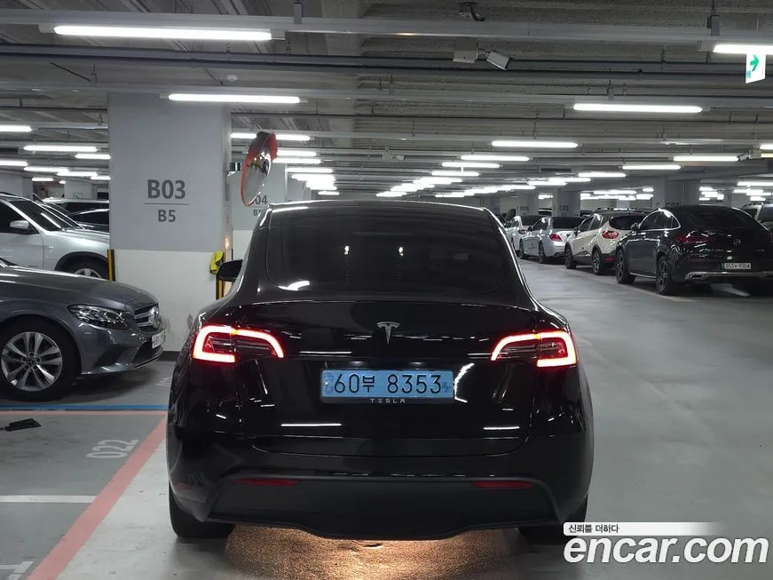 Tesla Model Y — фото 10