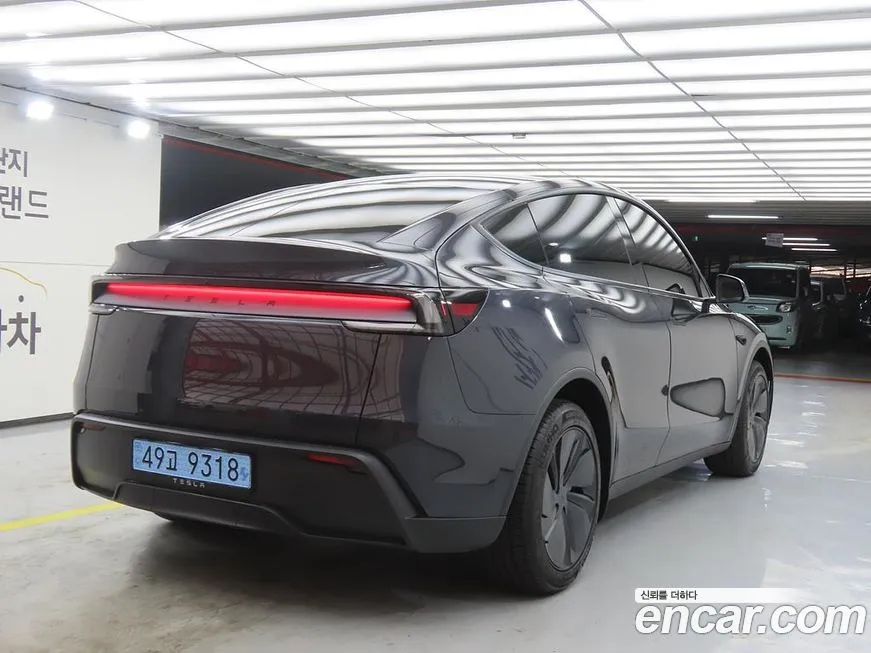 Tesla Model Y — фото 9