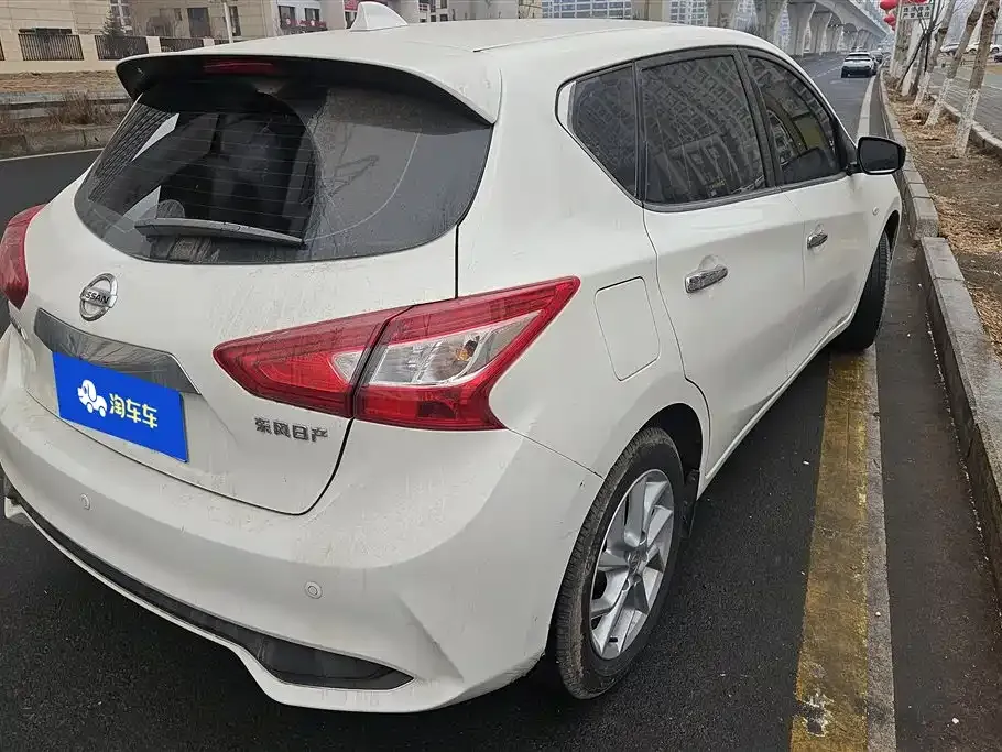 Nissan Tiida — фото 10