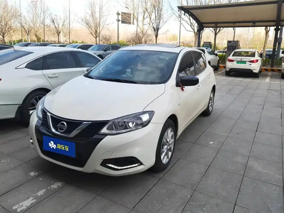 Nissan Tiida — фото 1