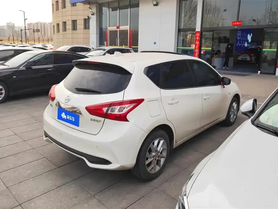 Nissan Tiida — фото 10