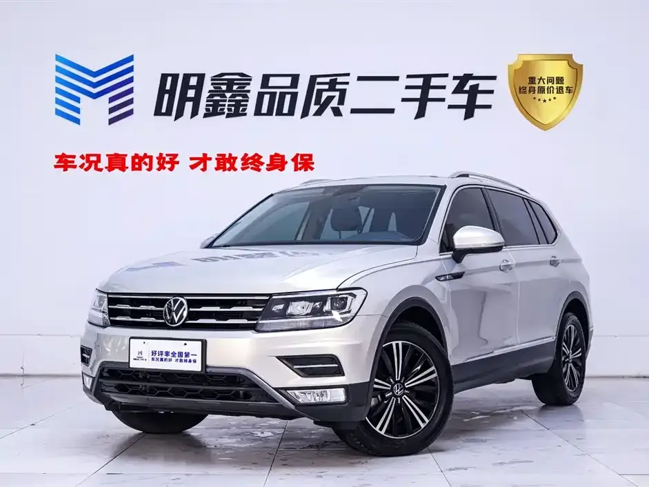 Volkswagen Tiguan L — фото 1