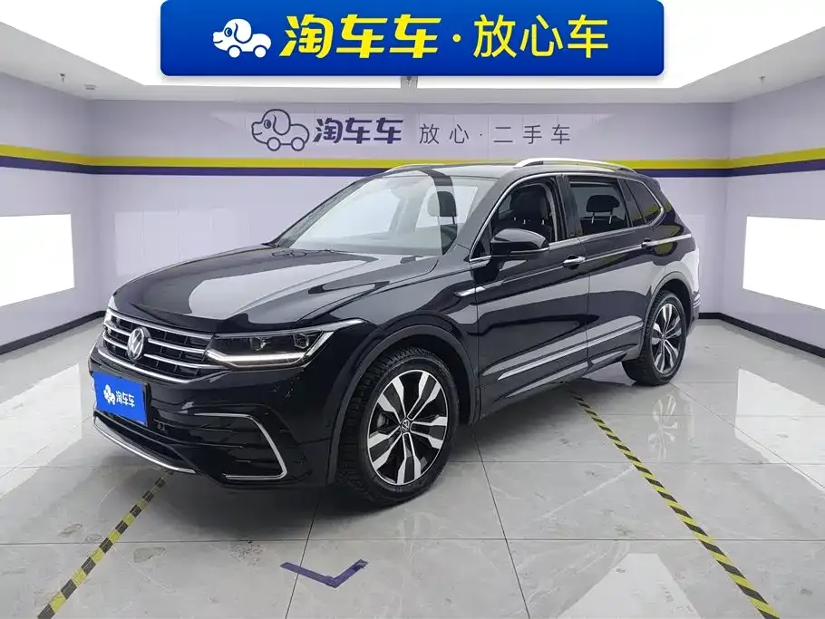 Volkswagen Tiguan L — фото 1