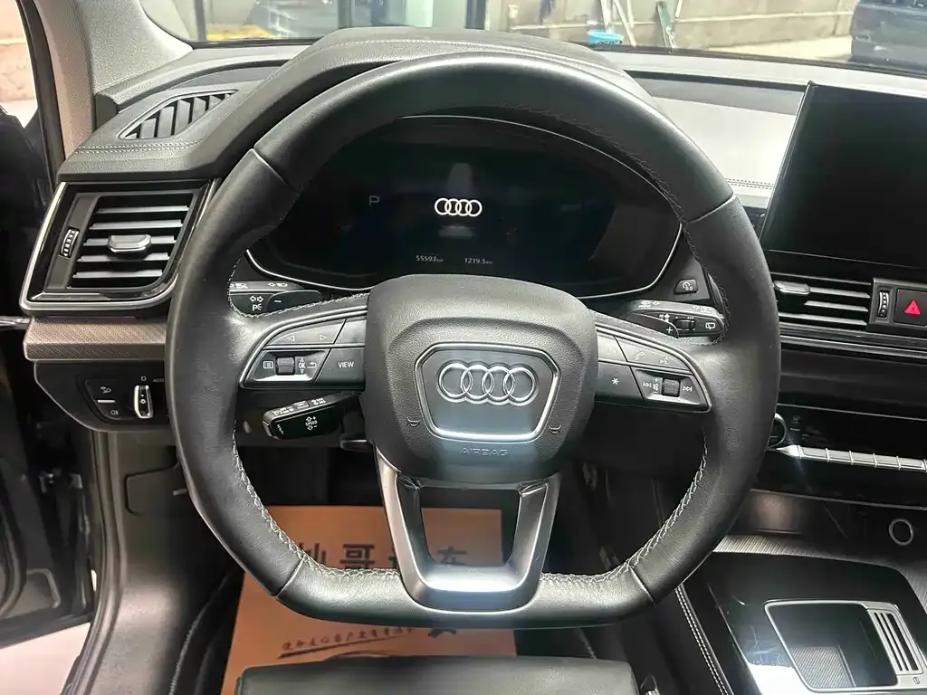 Audi Q5L — фото 10