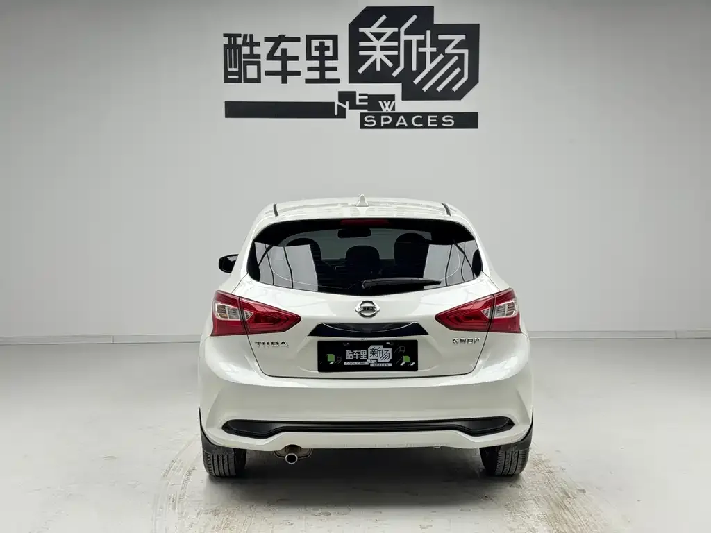 Nissan Tiida — фото 10