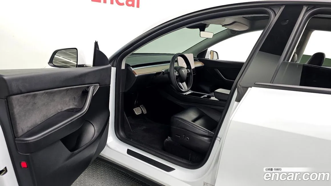 Tesla Model Y — фото 9