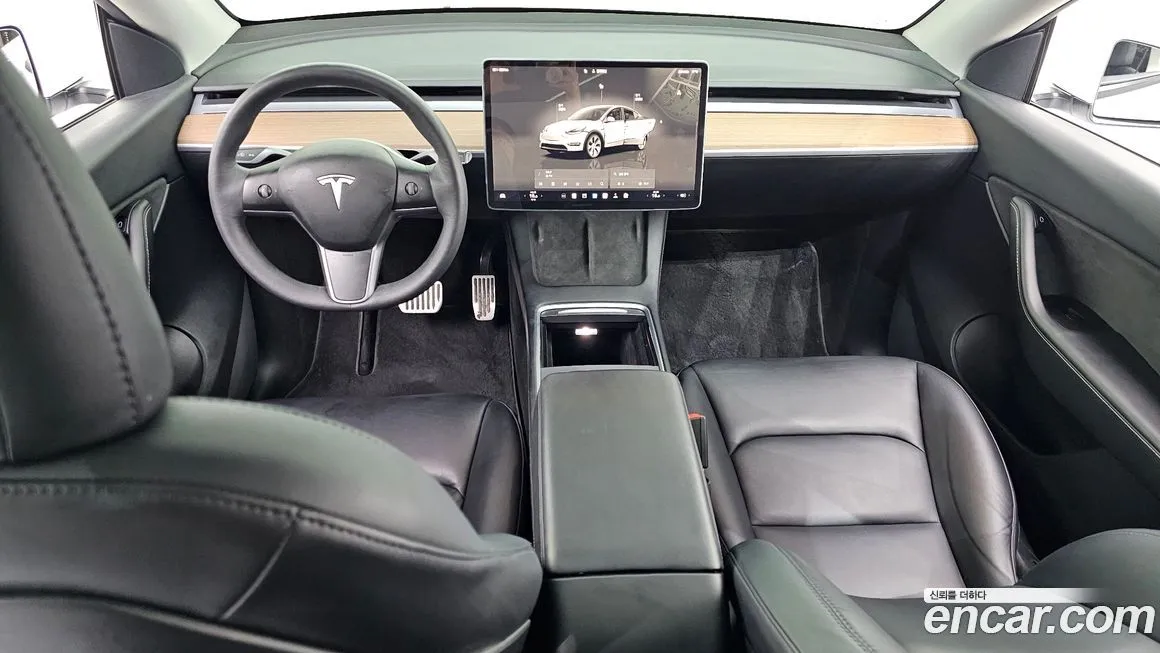 Tesla Model Y — фото 10