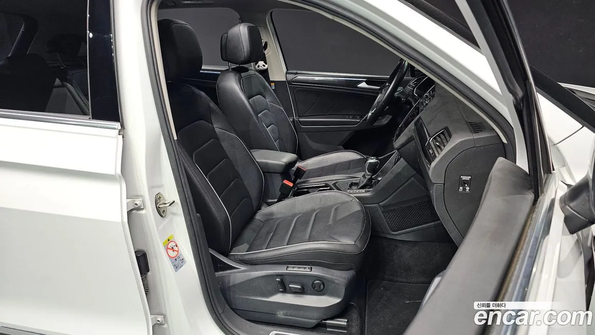 Volkswagen Tiguan — фото 10
