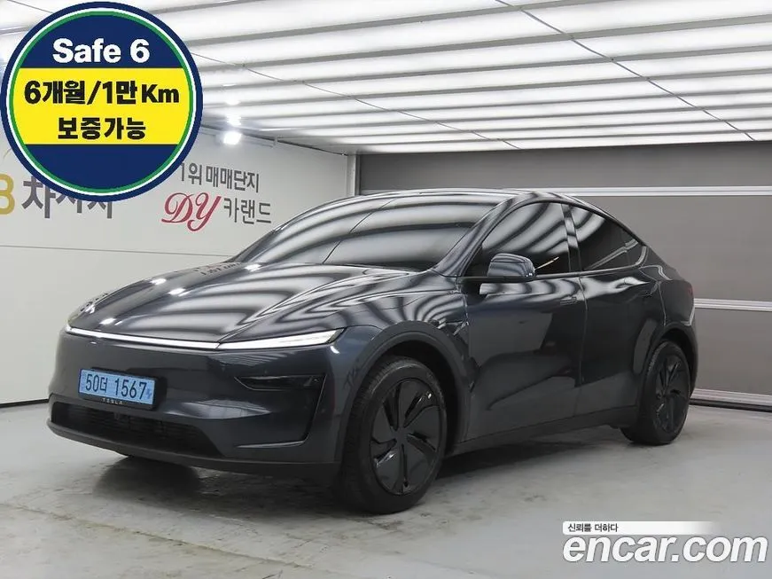Tesla Model Y — фото 1