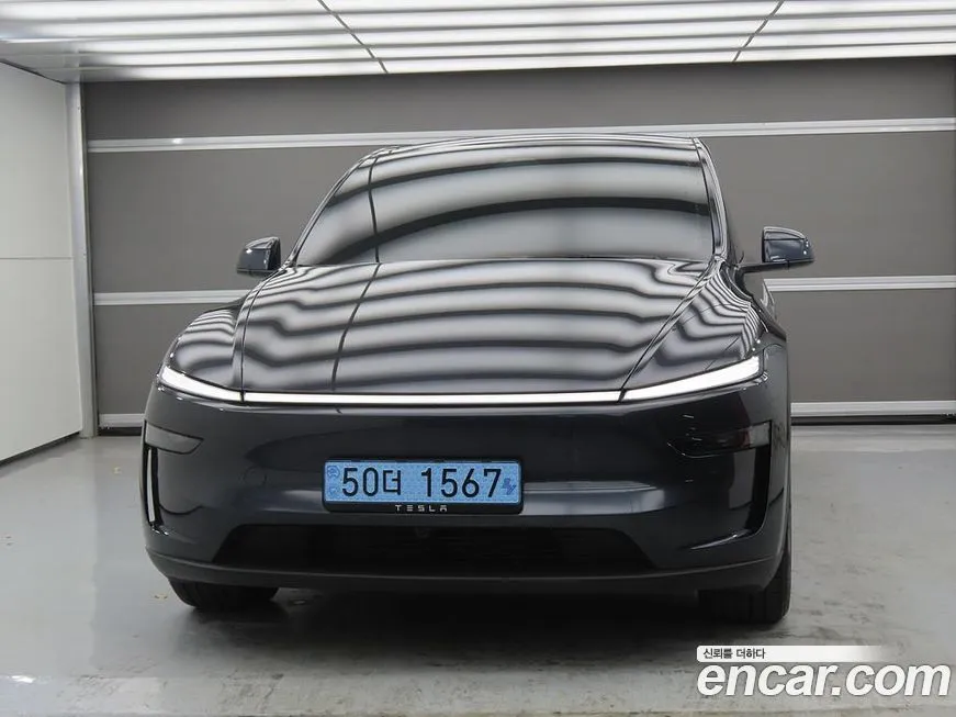 Tesla Model Y — фото 9