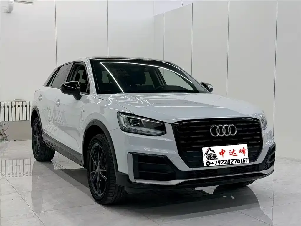 Audi Q2L — фото 5