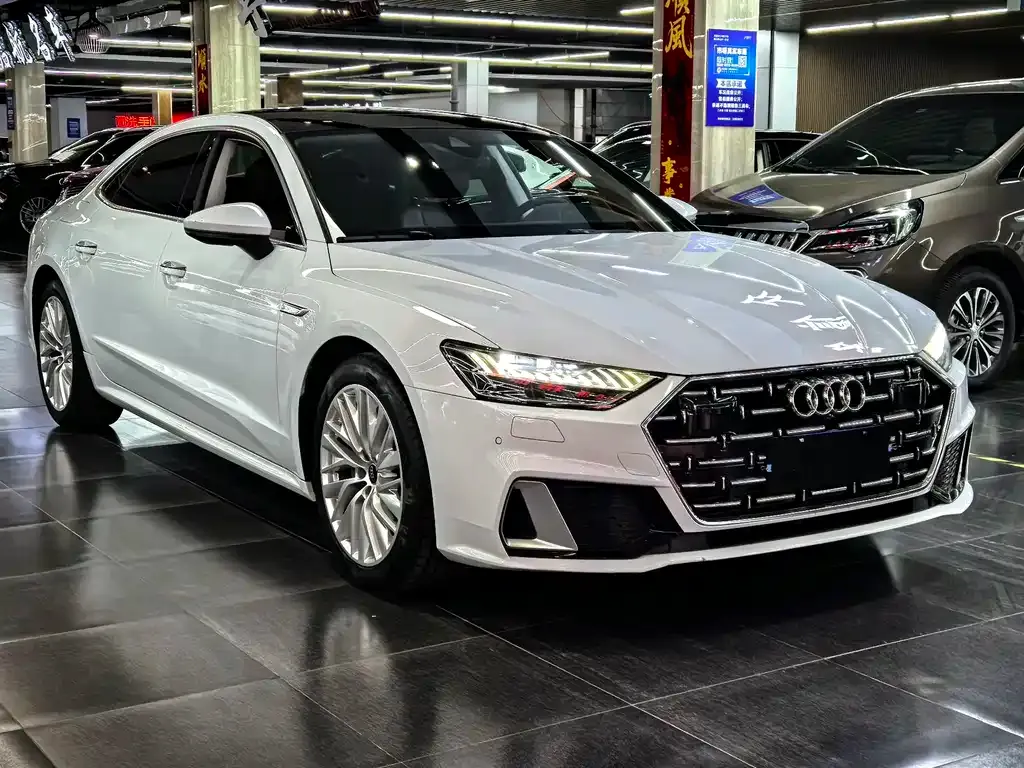 Audi A7L — фото 8