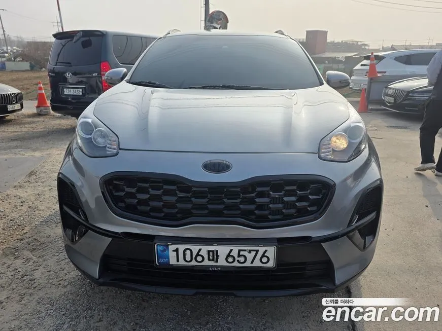 Kia Sportage — фото 1