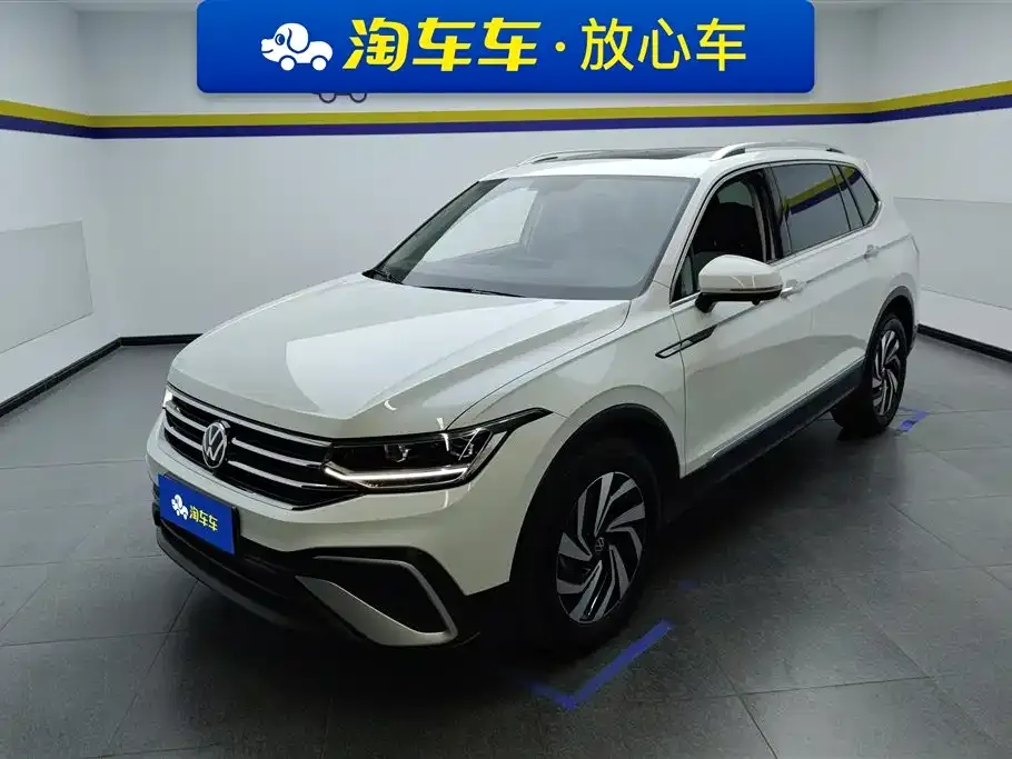 Volkswagen Tiguan L — фото 1