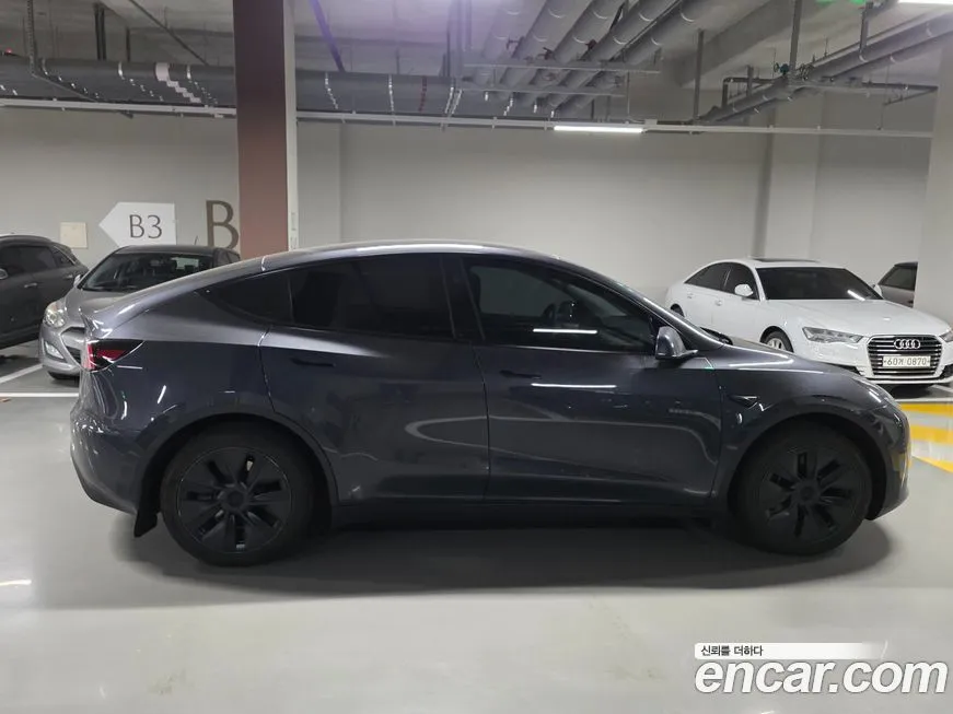 Tesla Model Y — фото 8