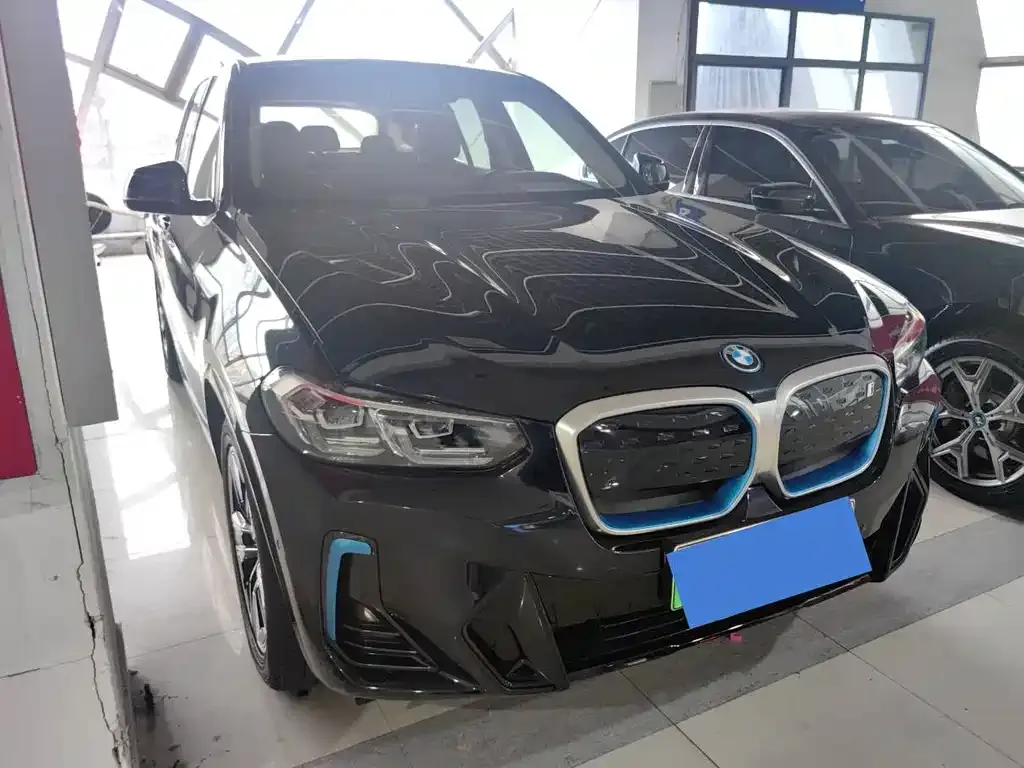 BMW iX3 — фото 10