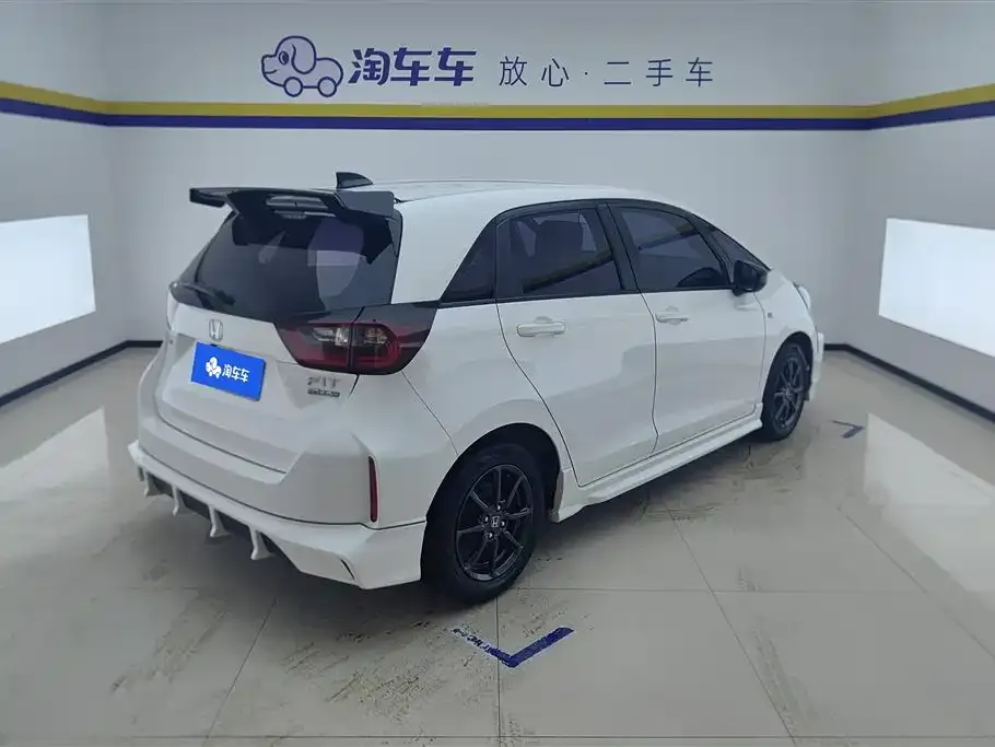 Honda Fit — фото 8