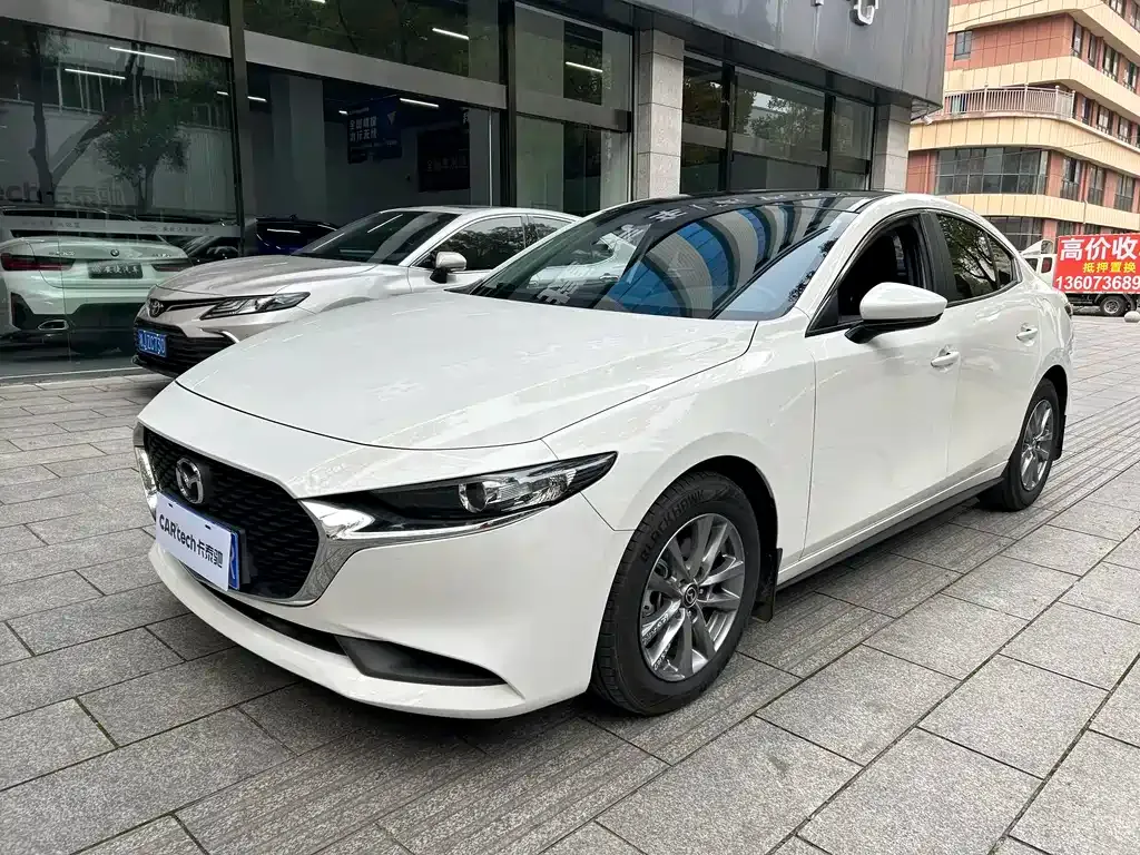 Mazda 3 Axela — фото 1