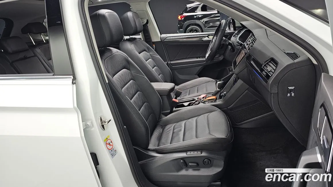 Volkswagen Tiguan — фото 10