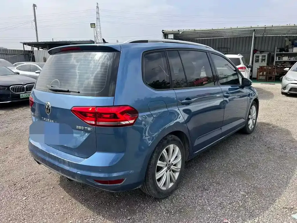 Volkswagen Touran — фото 10