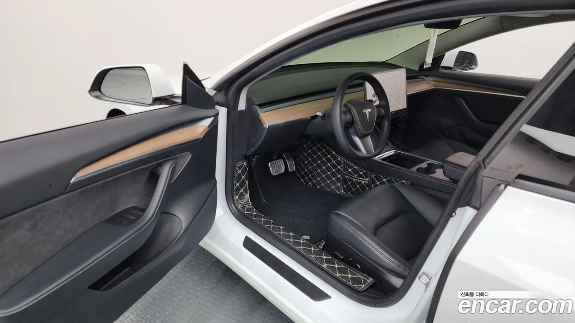 Tesla Model 3 — фото 9