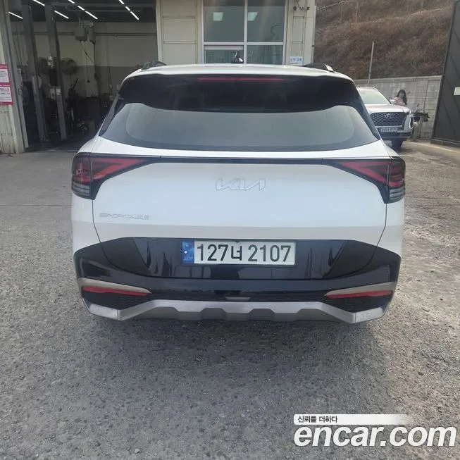 Kia Sportage — фото 10